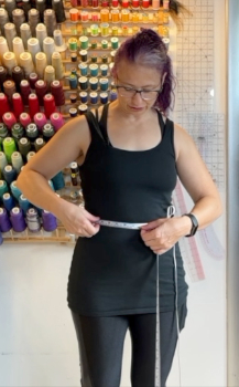 Measruements2 Image of Neta measuring herself to get measurments to draft patterns.