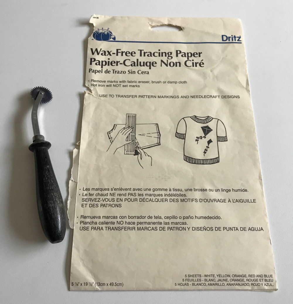 Tracing Paper Tracing Wheel next to a pack of tracing paper